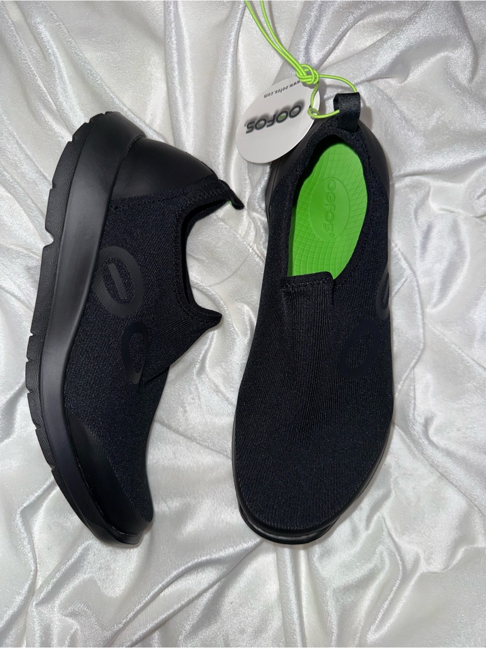 Oofos OOMG Slip-On Recovery Shoe in Black with Neon Green Insole